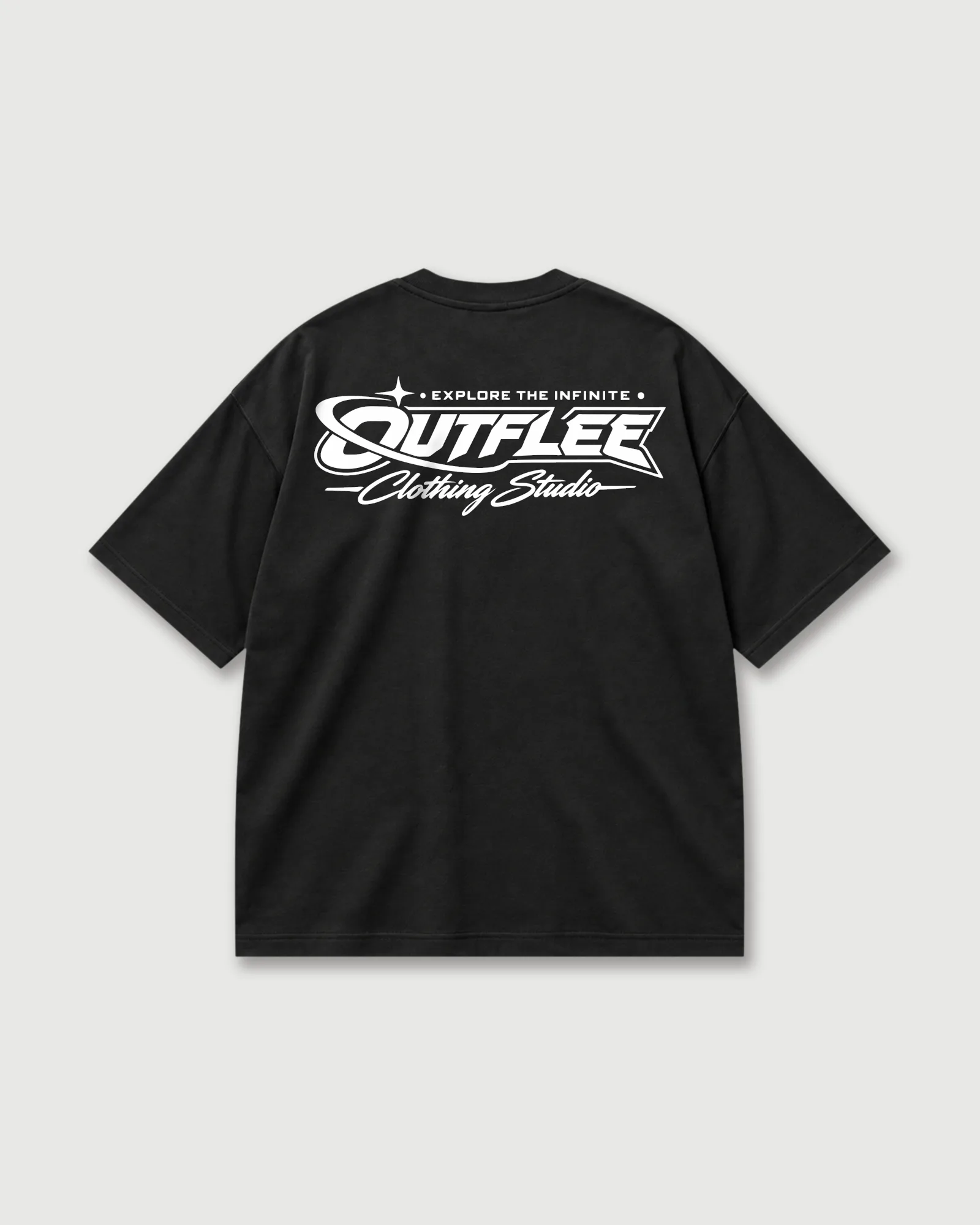 Back of a black Outflee Infinite Orbit drop shoulder T-shirt with bold white Outflee lettering, orbit graphics and “Explore the Infinite” text.