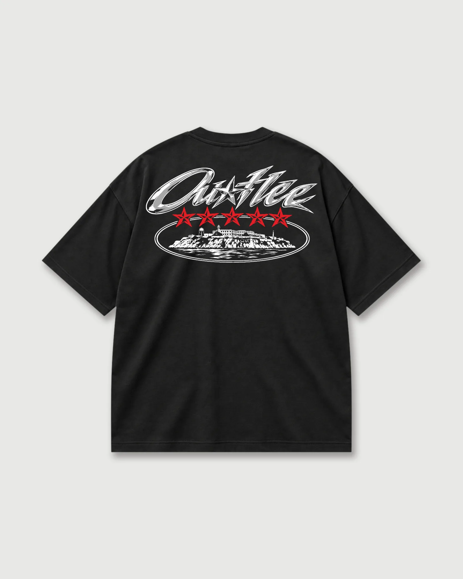 Back of a black Outflee Five Star Escape drop shoulder T-shirt with chrome lettering, five red stars and a monochrome island graphic.