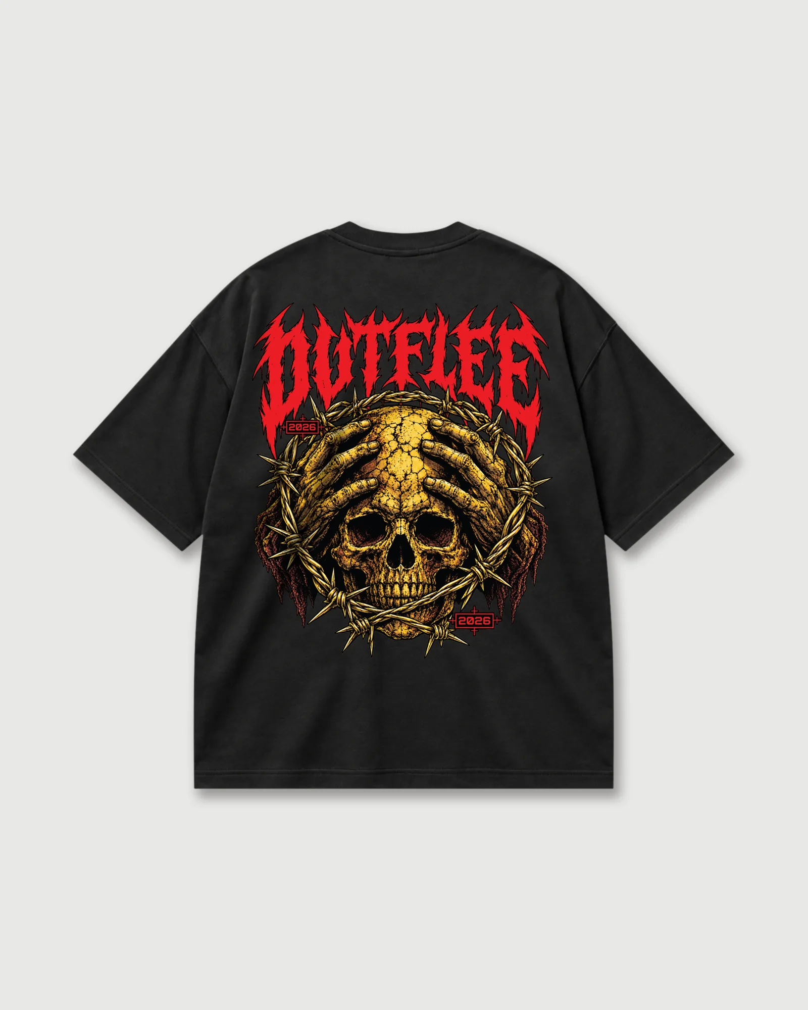 Back of a black Outflee Thornbound Skull T-shirt with a large gold skull, skeletal hands, a thorn ring and red lettering.