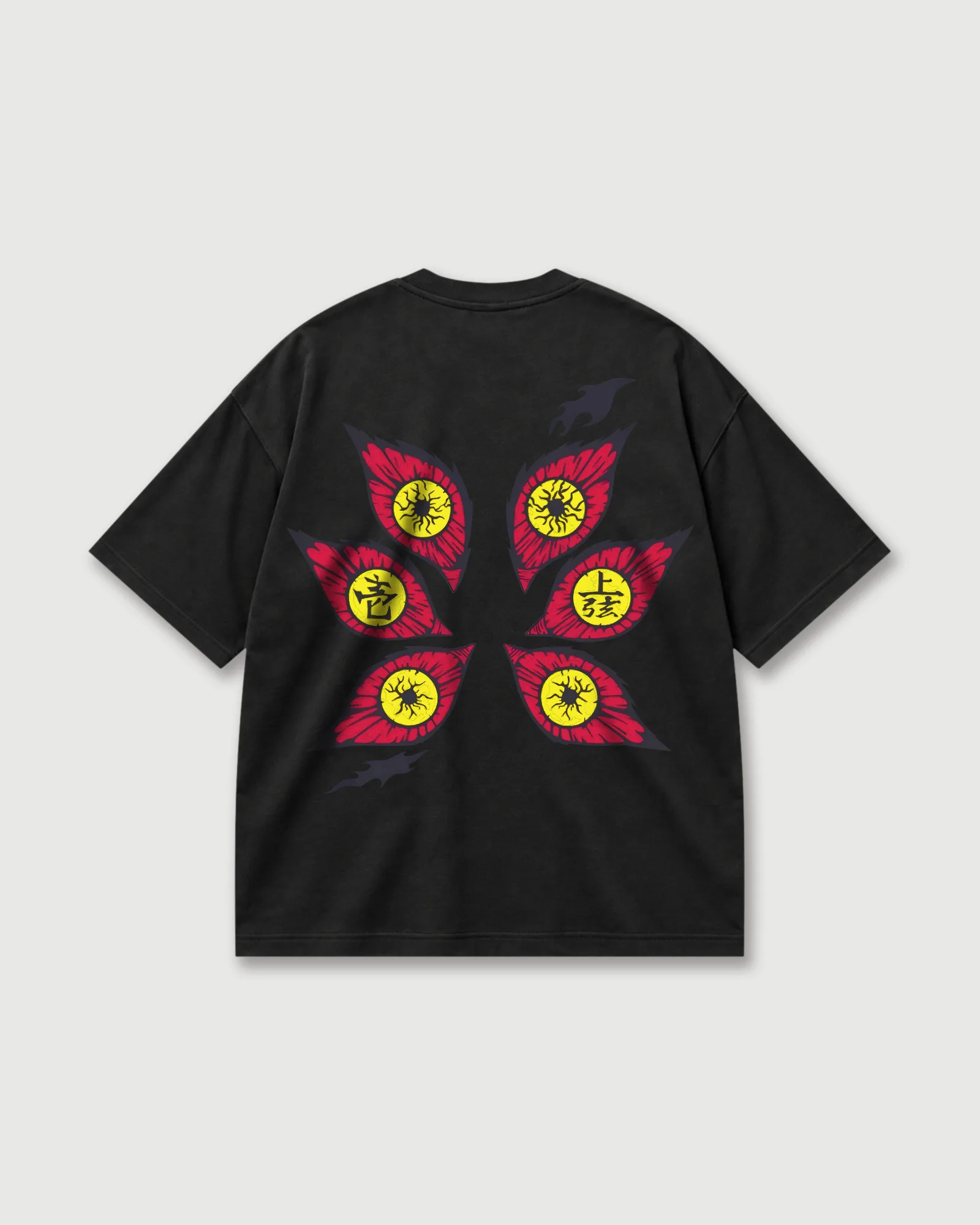Back of a black Outflee Sixfold Gaze drop shoulder T-shirt with six red eye-shaped graphics, yellow centres and dark symbolic details.